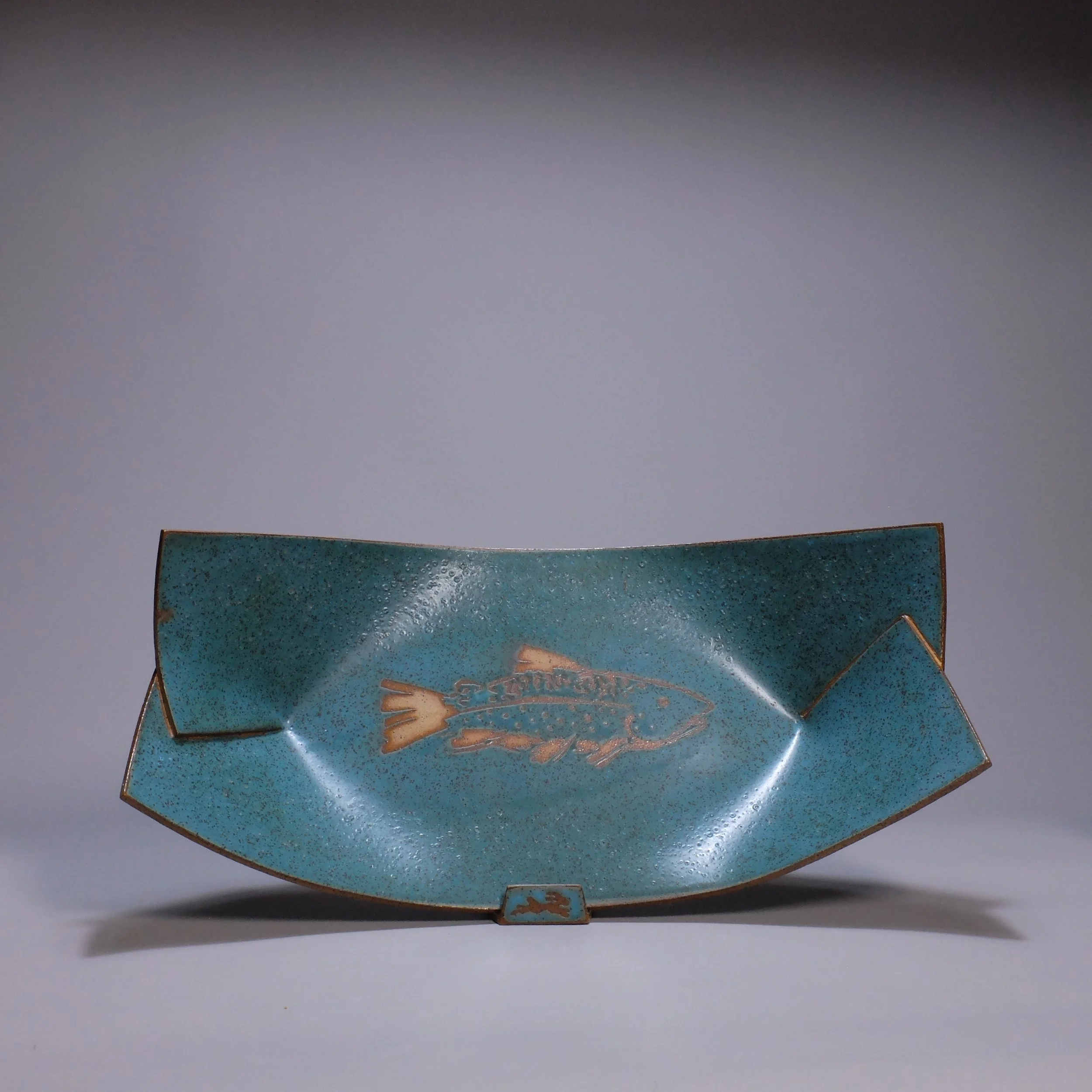 Big Boat, 2026. Speckled stoneware, turquoise matte glaze, brook trout motif. 16.5"L, 8.5"W, 5.25"D.