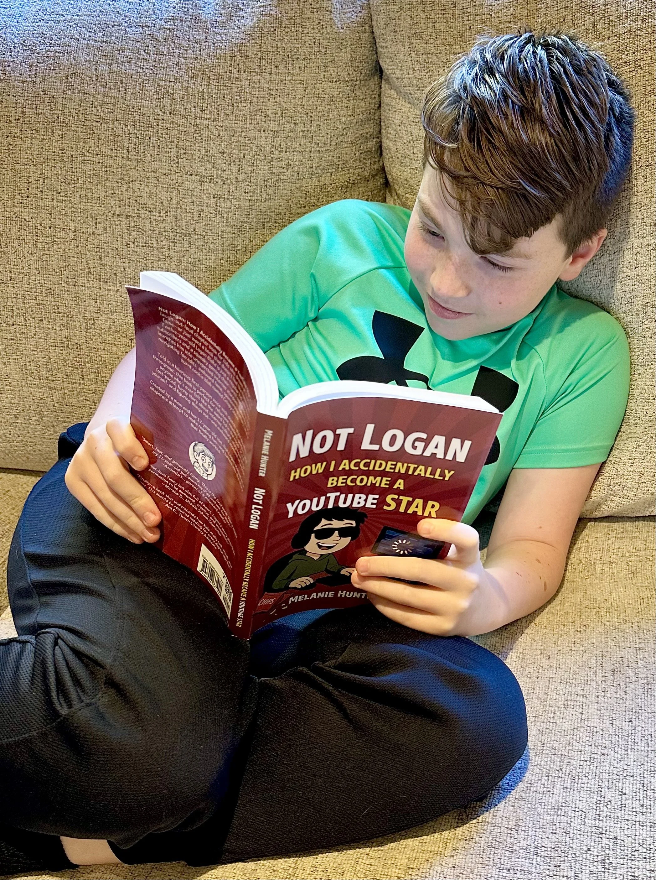 Hunter reading the book