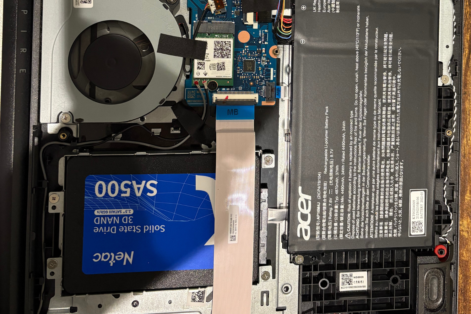 Inside view of an Acer laptop showing a blue solid-state drive (SSD), performed by LaunchLayer in Wickford..
