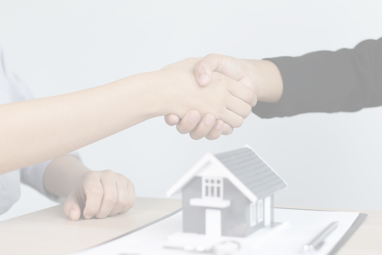 Happy homebuyers celebrating after closing with Gillian Gooch Properties in Georgia and Florida.