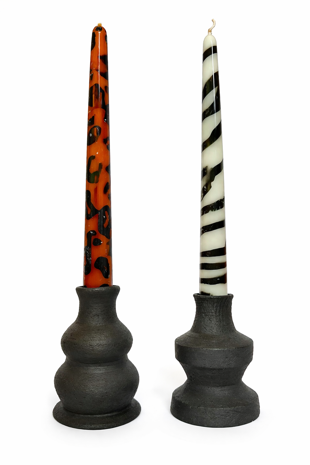 pair of black candleholder with leopard and zebra print candles