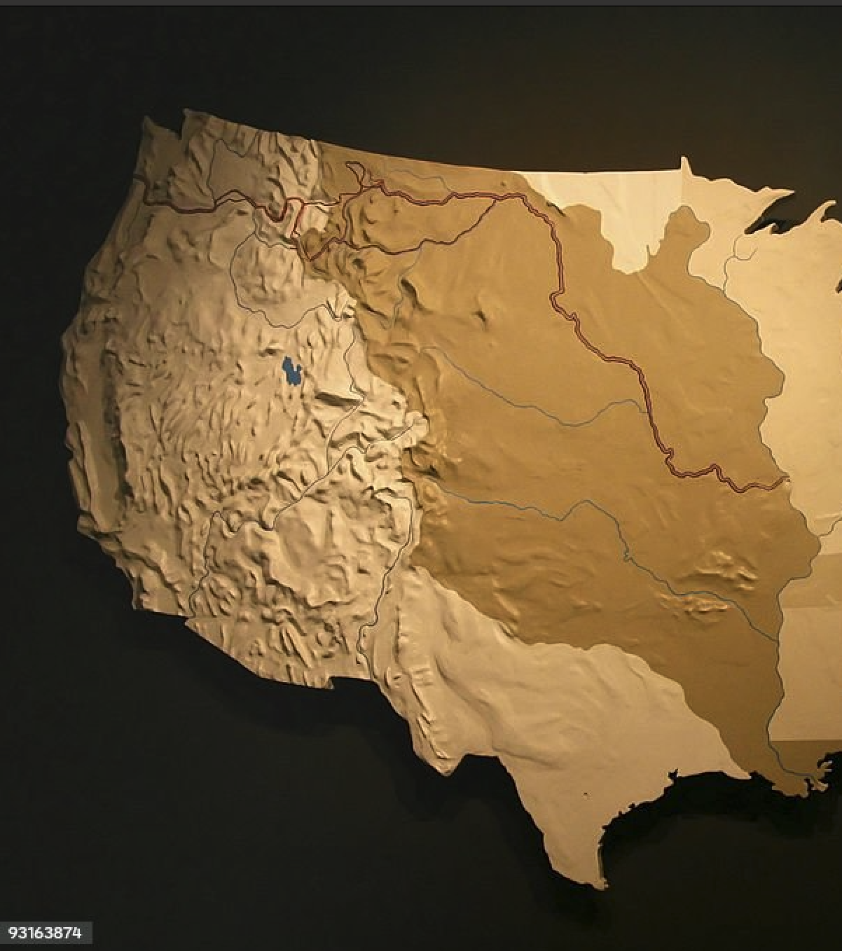 A three-dimensional topographic map of the United States with elevation details and water features.