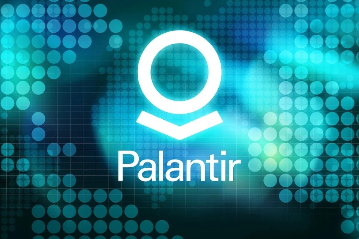 Digital graphic with blue and teal dots and grid pattern. White logo of a circle over a downward arrow and the text 'Palantir' below, representing the Palantir Technologies logo.