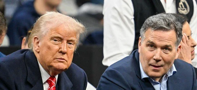 Donald Trump and Ted Cruz sitting together at an event.