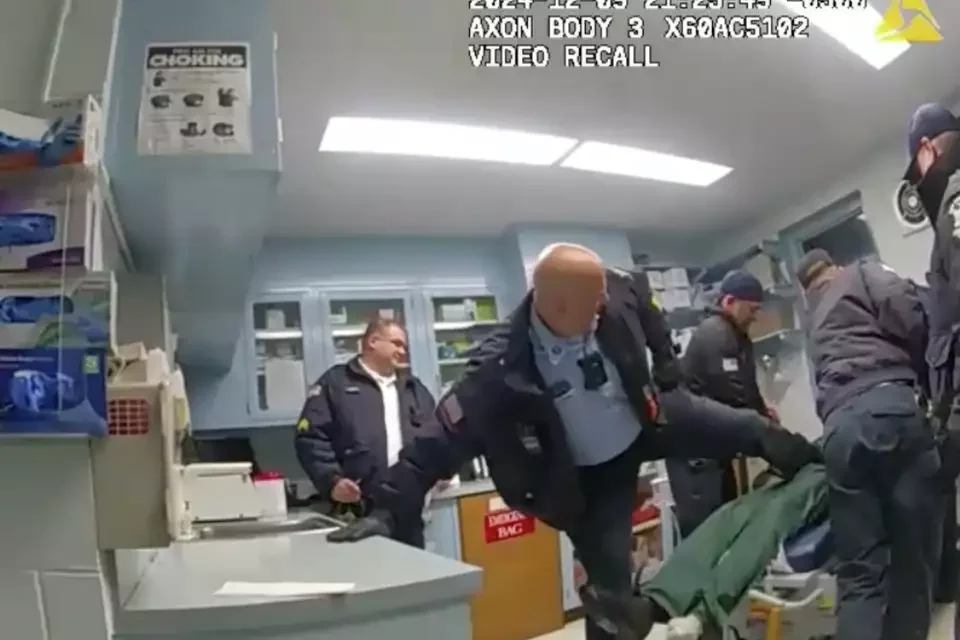 prison guard kicking Robert
