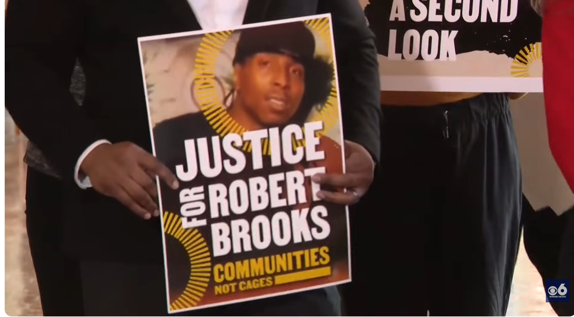 Sign that reads Justice for Robert Brooks