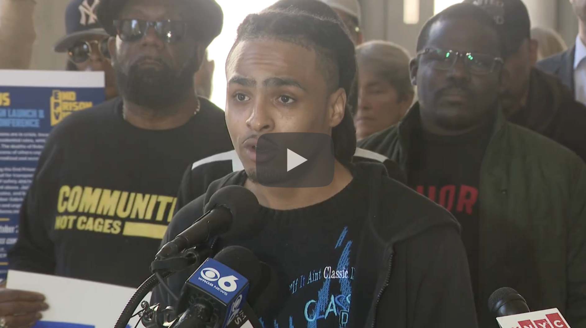 Young man at a podium