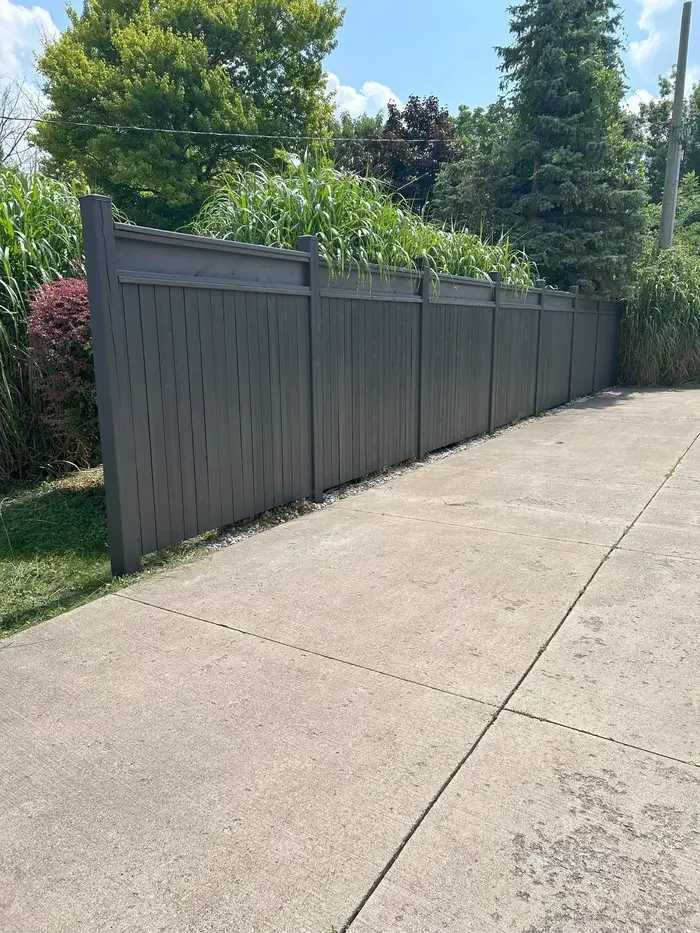 Freshly painted exterior fence.