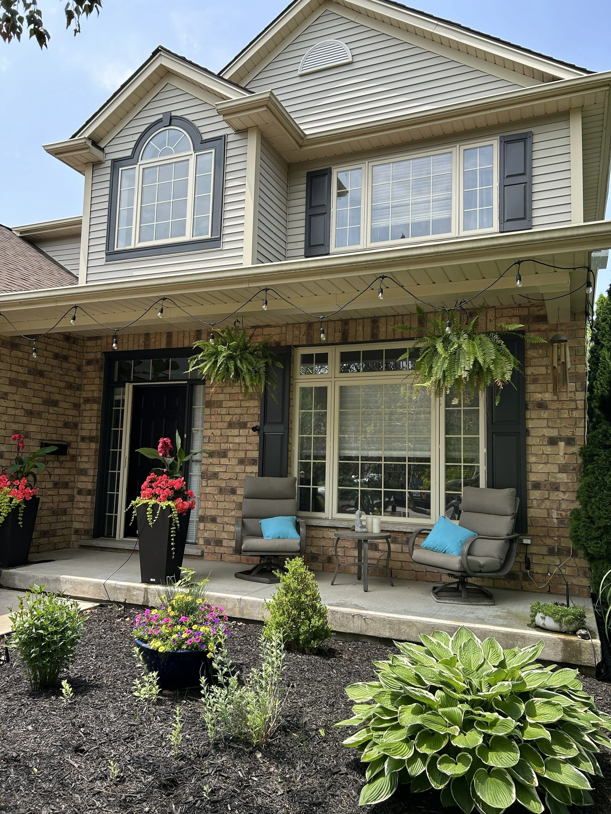 The project included painting the:  Stucco Shutters Window frames Garage frames Door frames