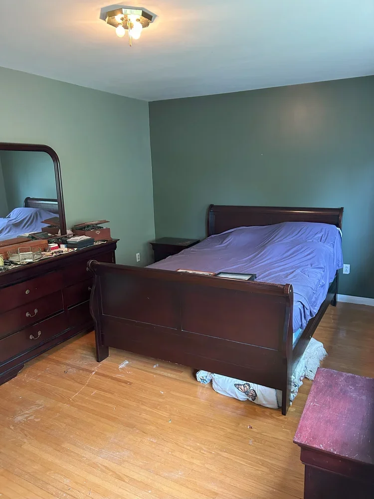 Green Bedroom with accent wall painted by Painters Near Me in Niagara