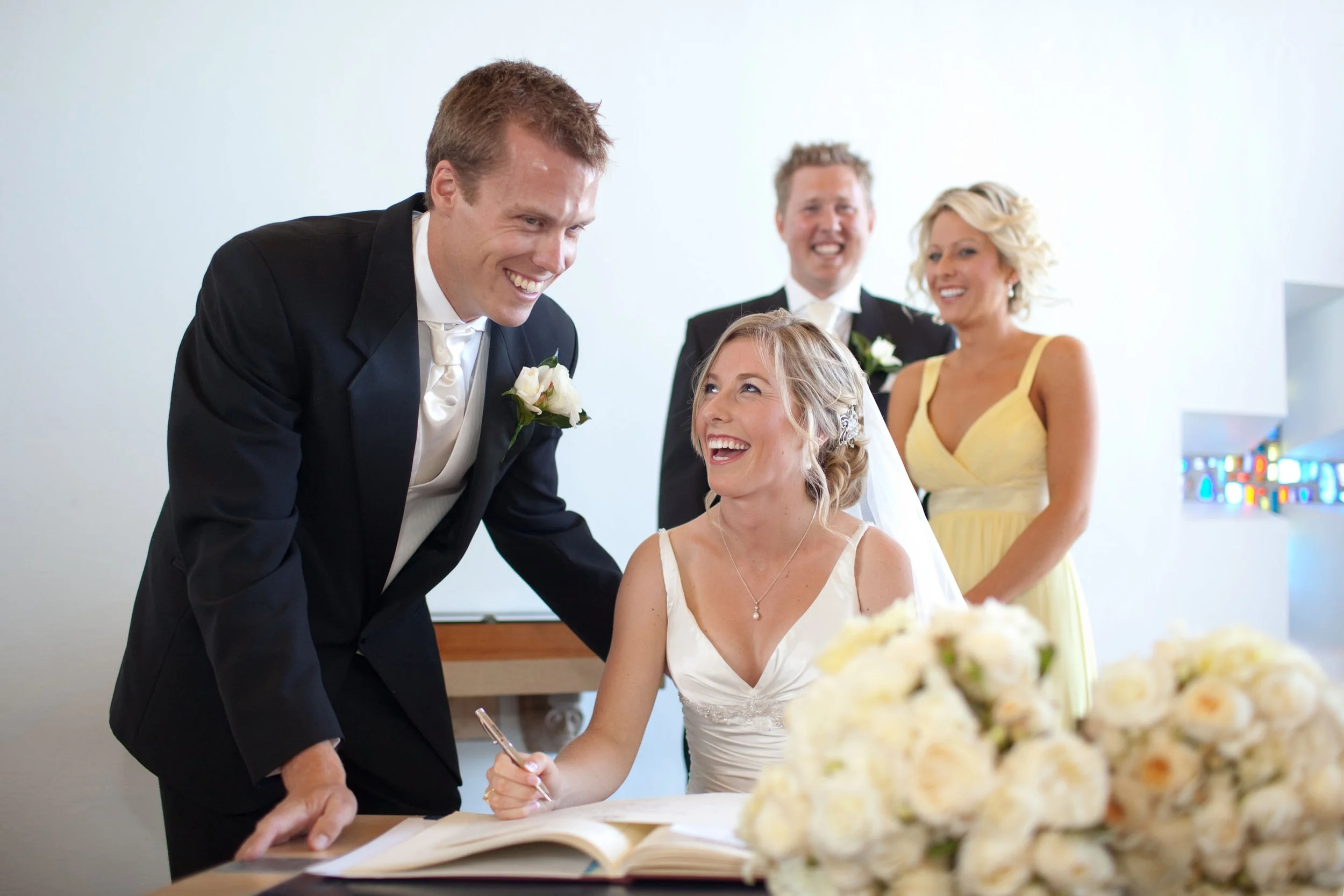 Signing of the Marriage certificate at HMAS Watson Chapel Watsons Bay