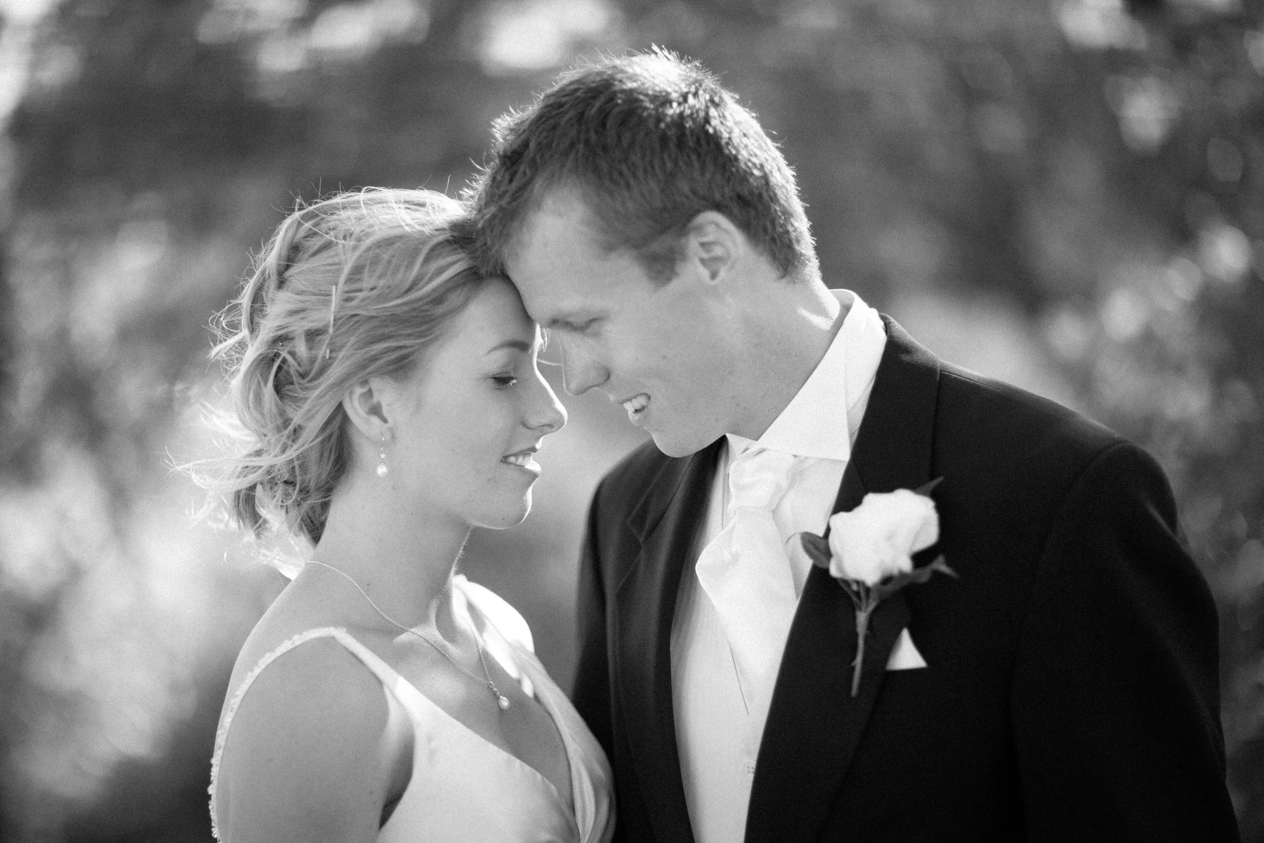 Black and white portrait of Naomi and Justin at Balmoral Beach during their wedding