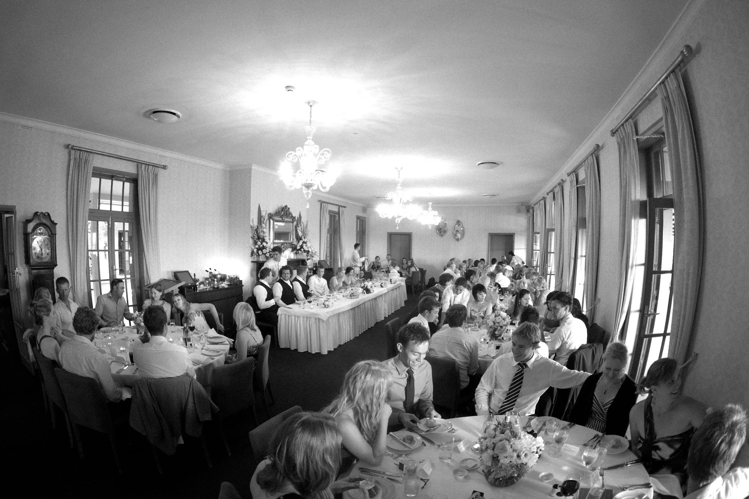 Evening lights and celebration at Gunners’ Barracks summer wedding reception room