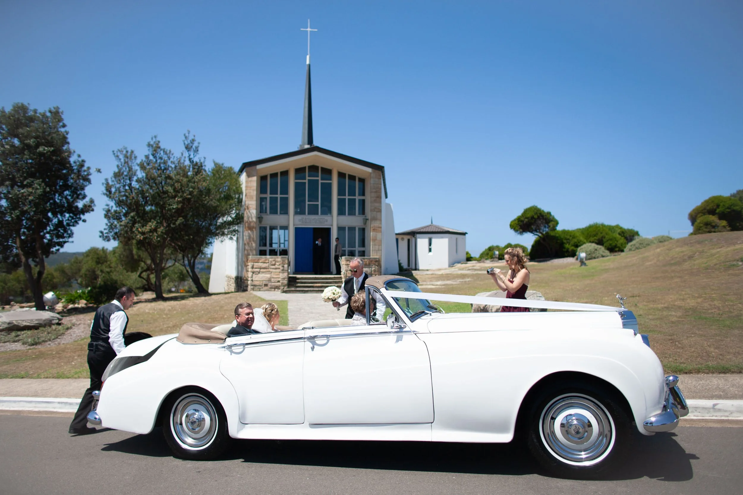 Rolls Royce arrives with Bride and father just before the start of his ceremony at HMAS Watson Chapel.