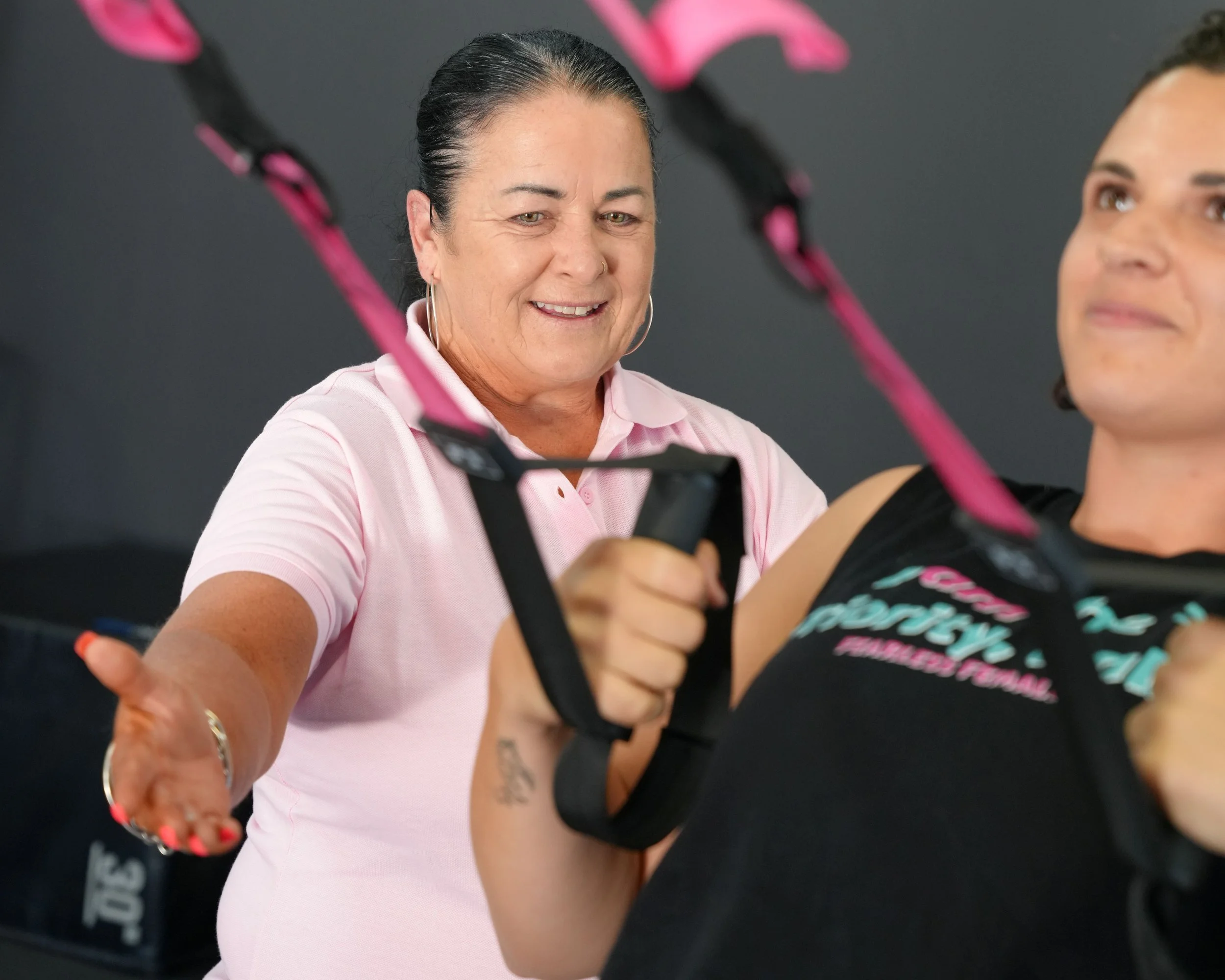 Strength Coach Sally-Anne with client on TRX