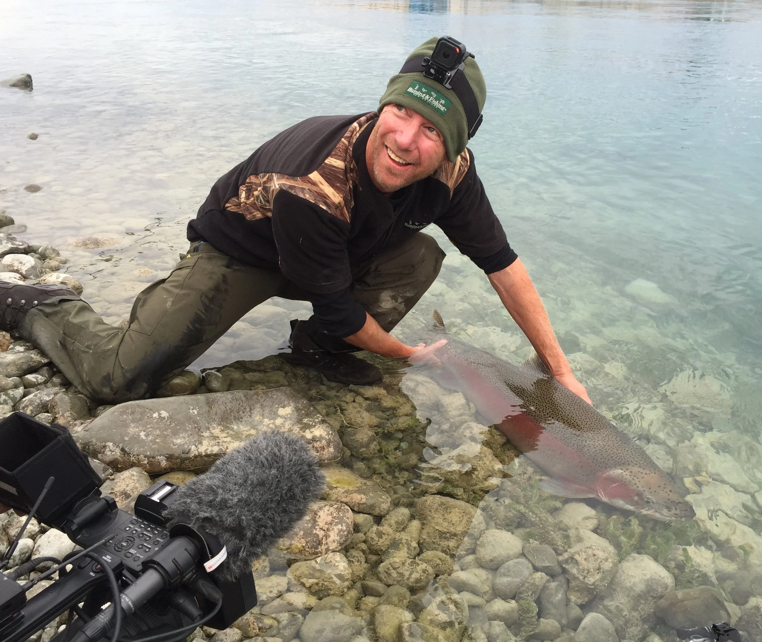 Matt releases big trout.JPG