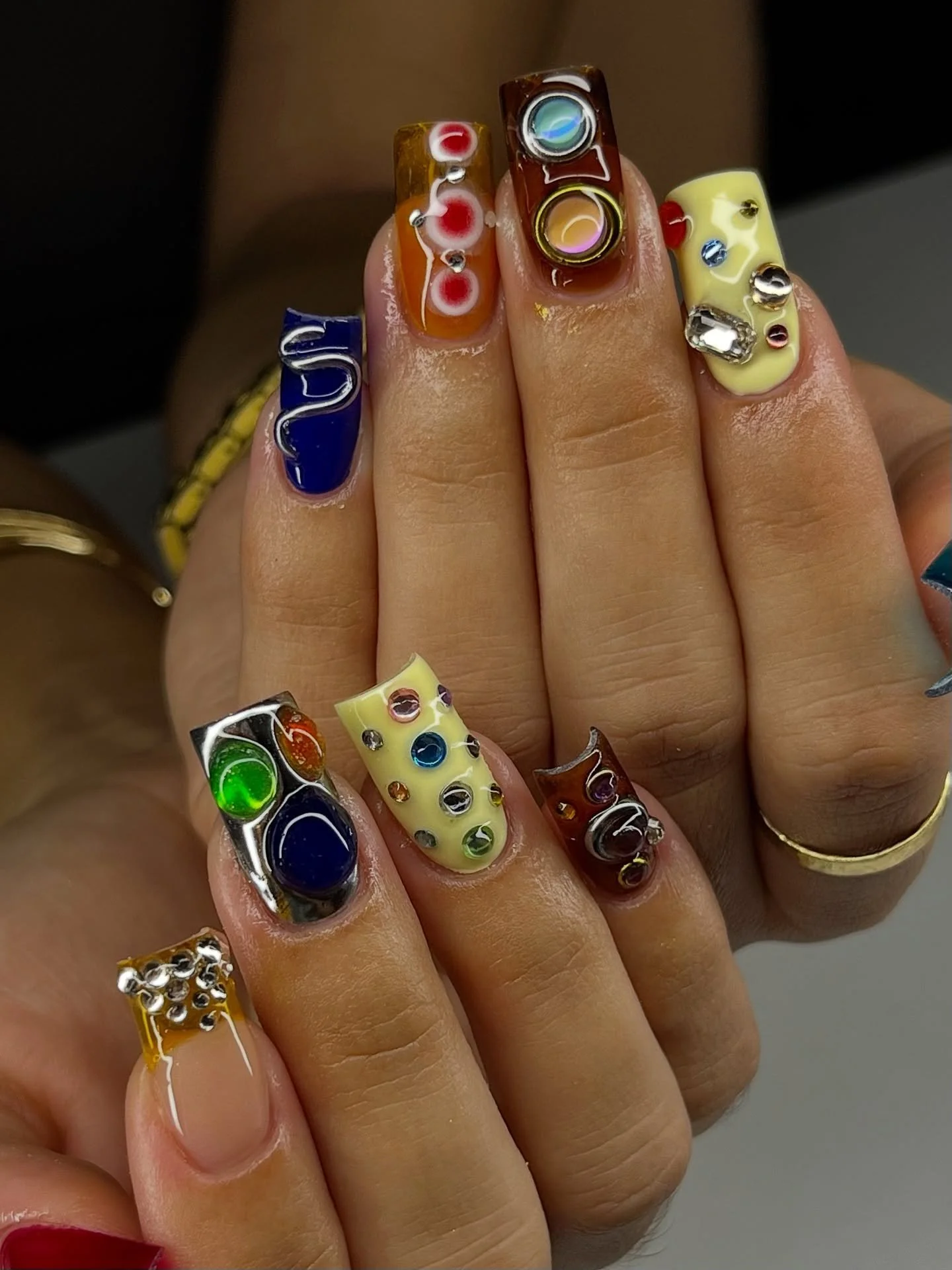 jelly colors and chromes and bubbles and rhinestones makes the perfect abstract mix match design&hellip; @madrinails inspo✨