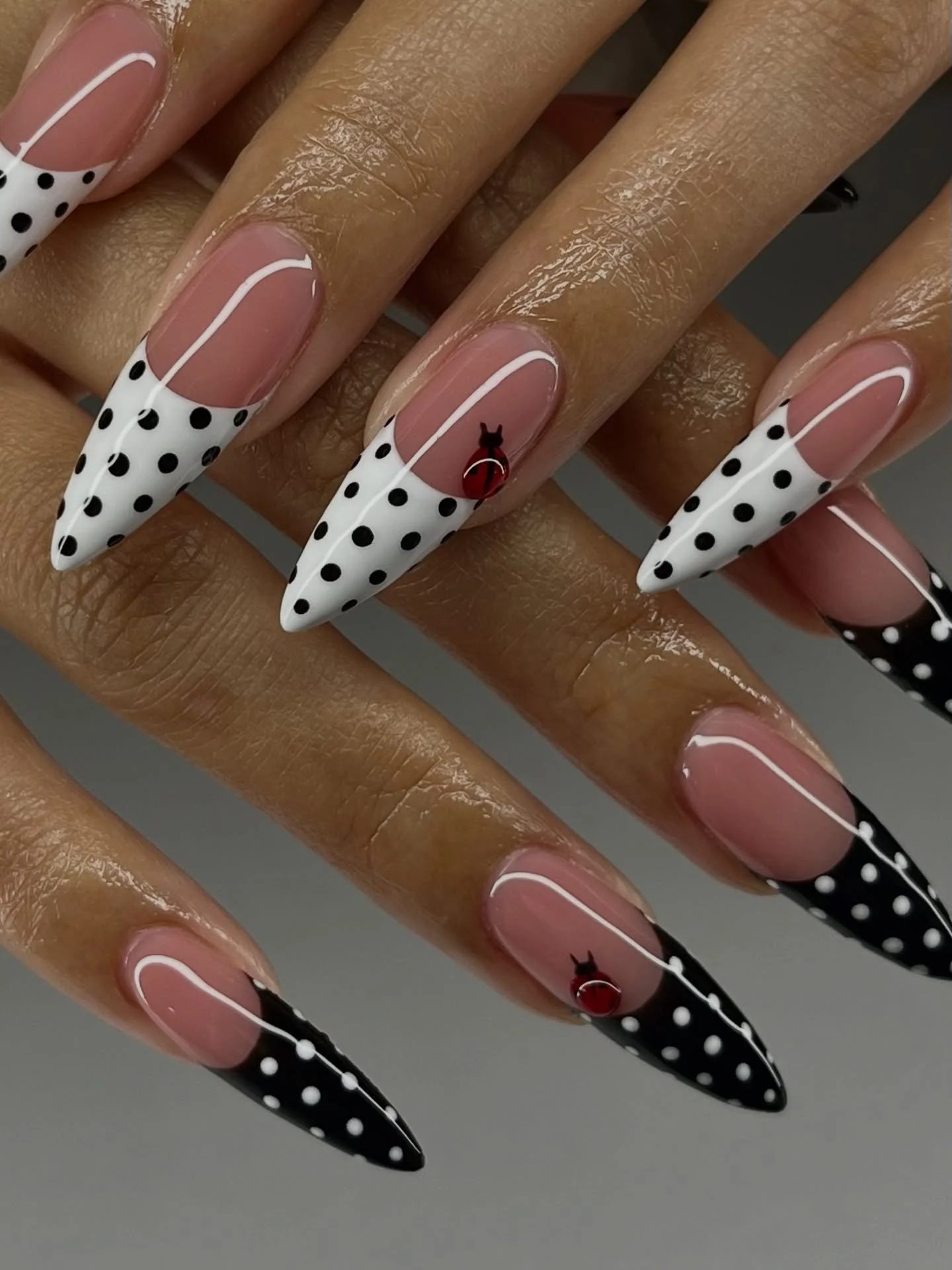 The polka dots r still hitting🐞🤍🖤