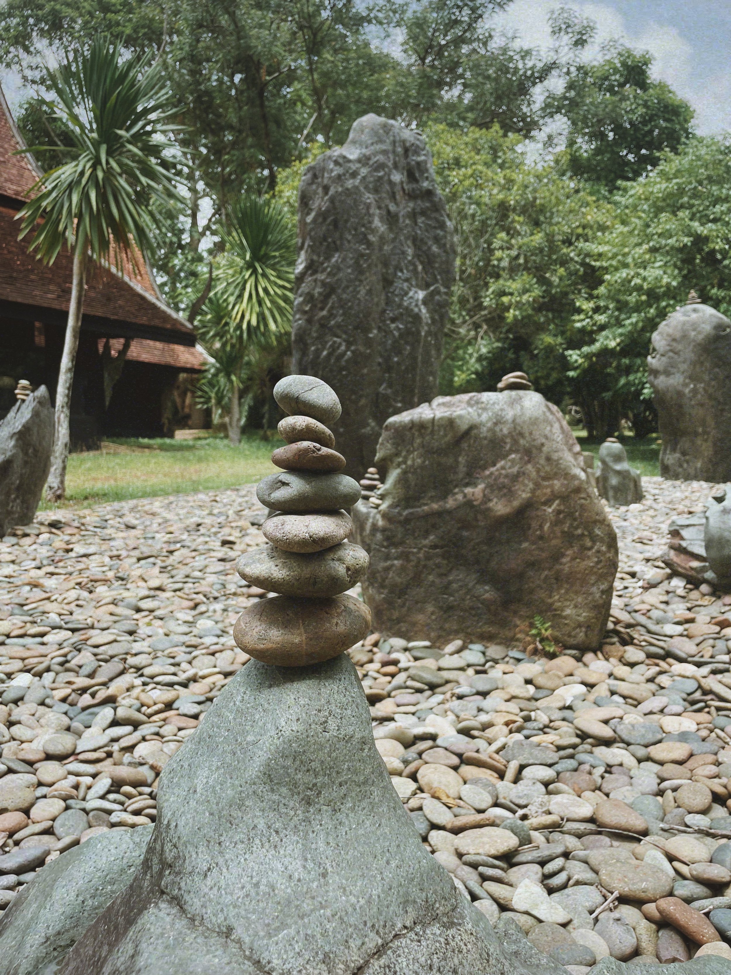 Chiang Mai 2023.
This was the first time I've ever stack rocks, I came across these carefully stacked rocks in a quiet part of a museum area.
I really wanted to create a stone stack of my own, but my mum was rushing me because we were leaving soon. D