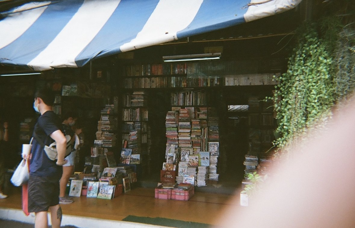 Bangkok 2023. This secondhand bookstore at Chatuchak market captured on my film camera. I've always enjoyed reading and this made me think about how one book can pass through different hands and carry a new meaning each time.