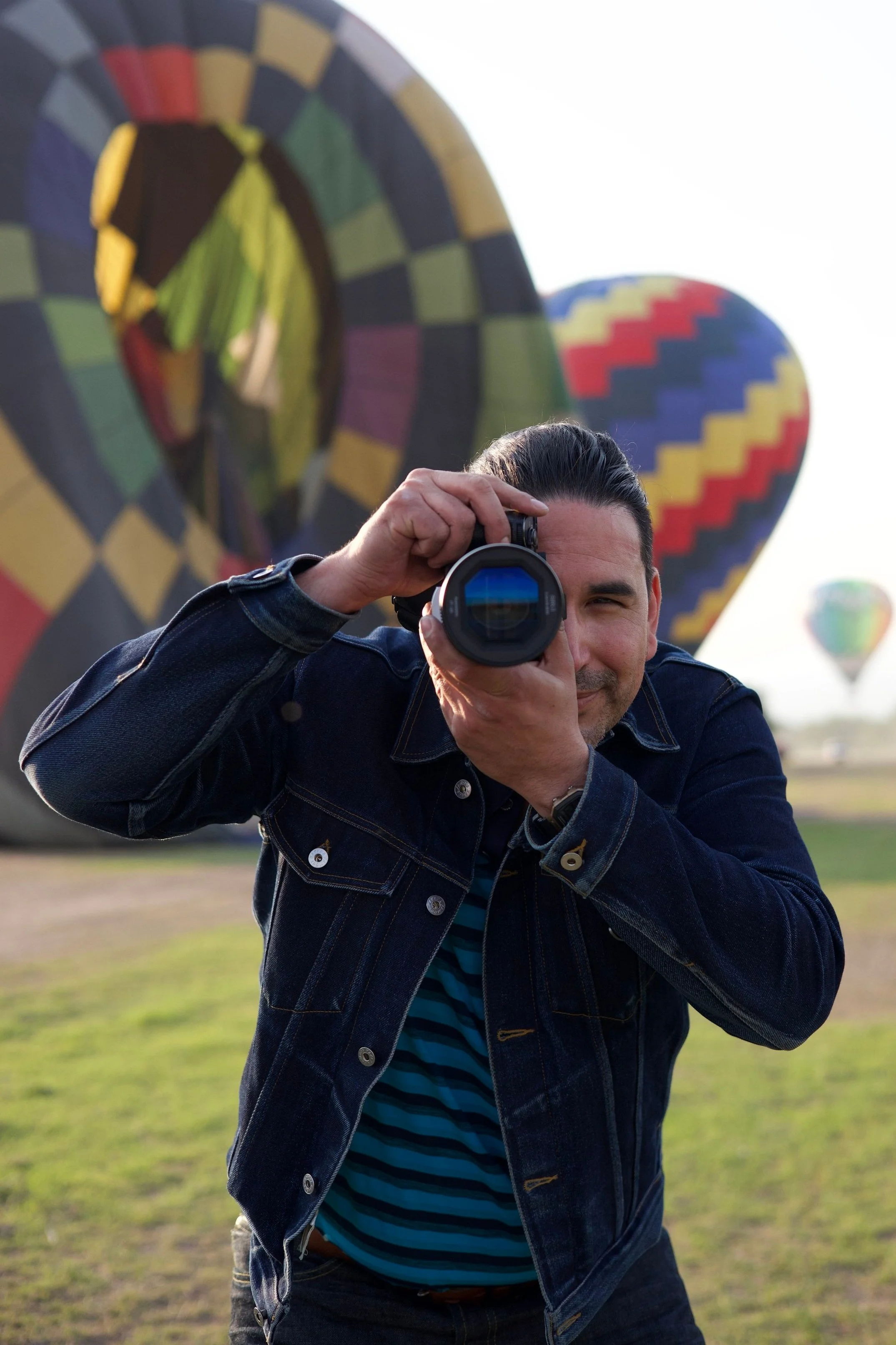 Harold Horsefall, Thunder Boy Studios photographer portrait in Calgary with hot air balloons