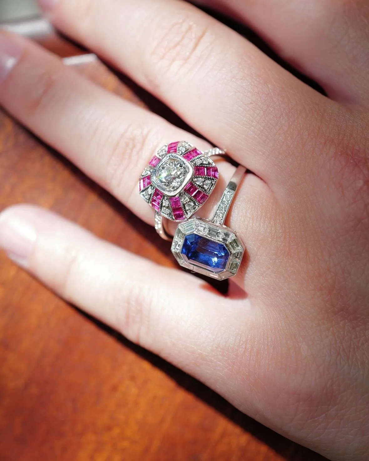 Two new beauties for the collection&hellip;. A #cornflowerblue sapphire set with beautiful milgrain detail and diamonds; and an #oldmindcutdiamond set within a ruby and diamond alternating design (sort of looks like rays☀️) also with #milgrain detail