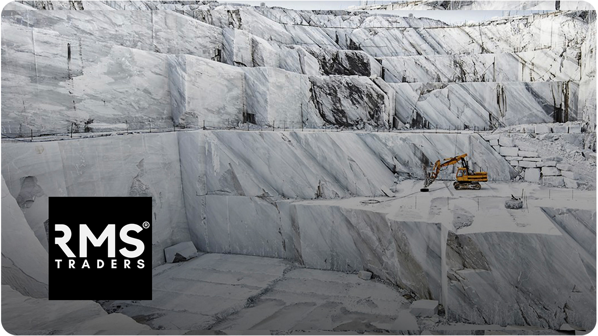 Marble quarry with large marble blocks and a small excavator, RMS Traders logo in the bottom left corner.