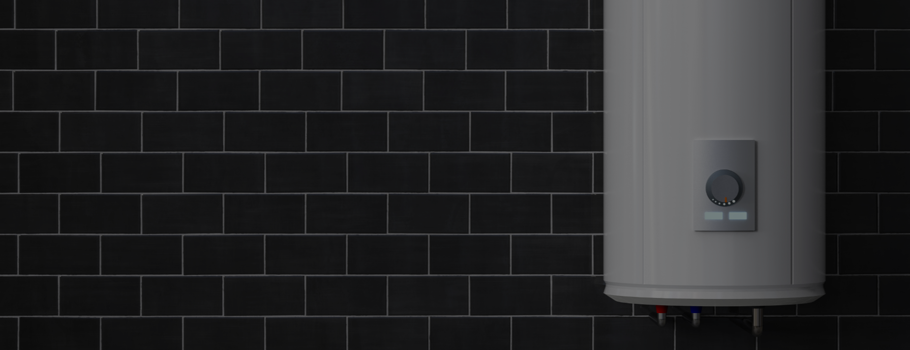 A wall-mounted water heater with a round temperature control dial on a dark tiled wall.