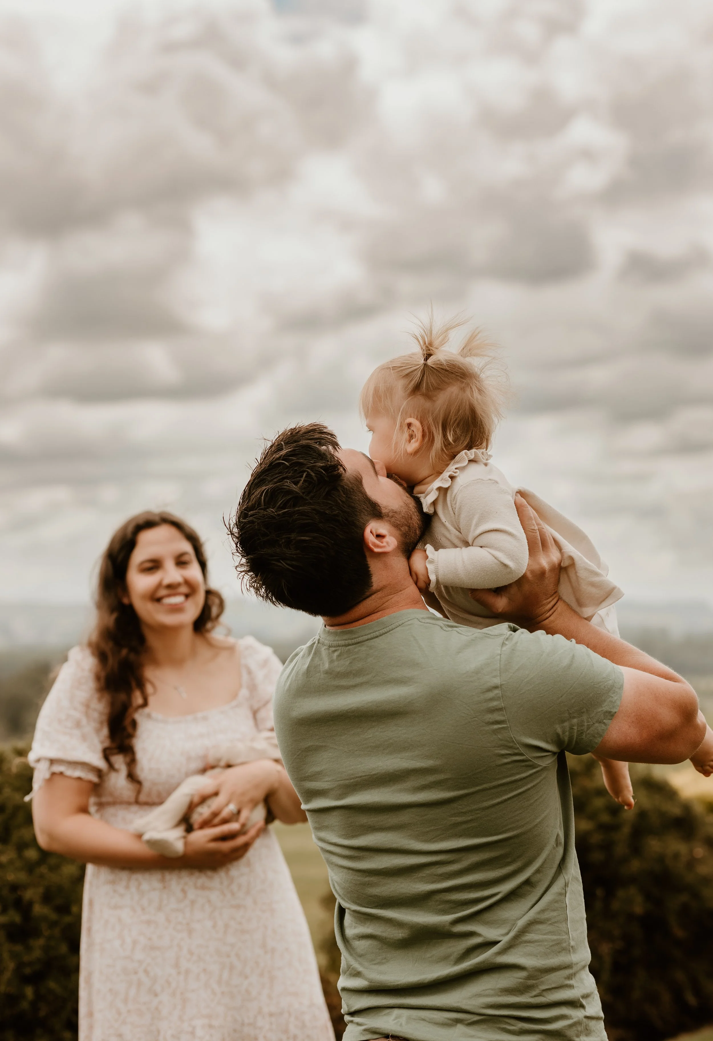 A sleeping baby wrapped in a cozy beige blanket.
