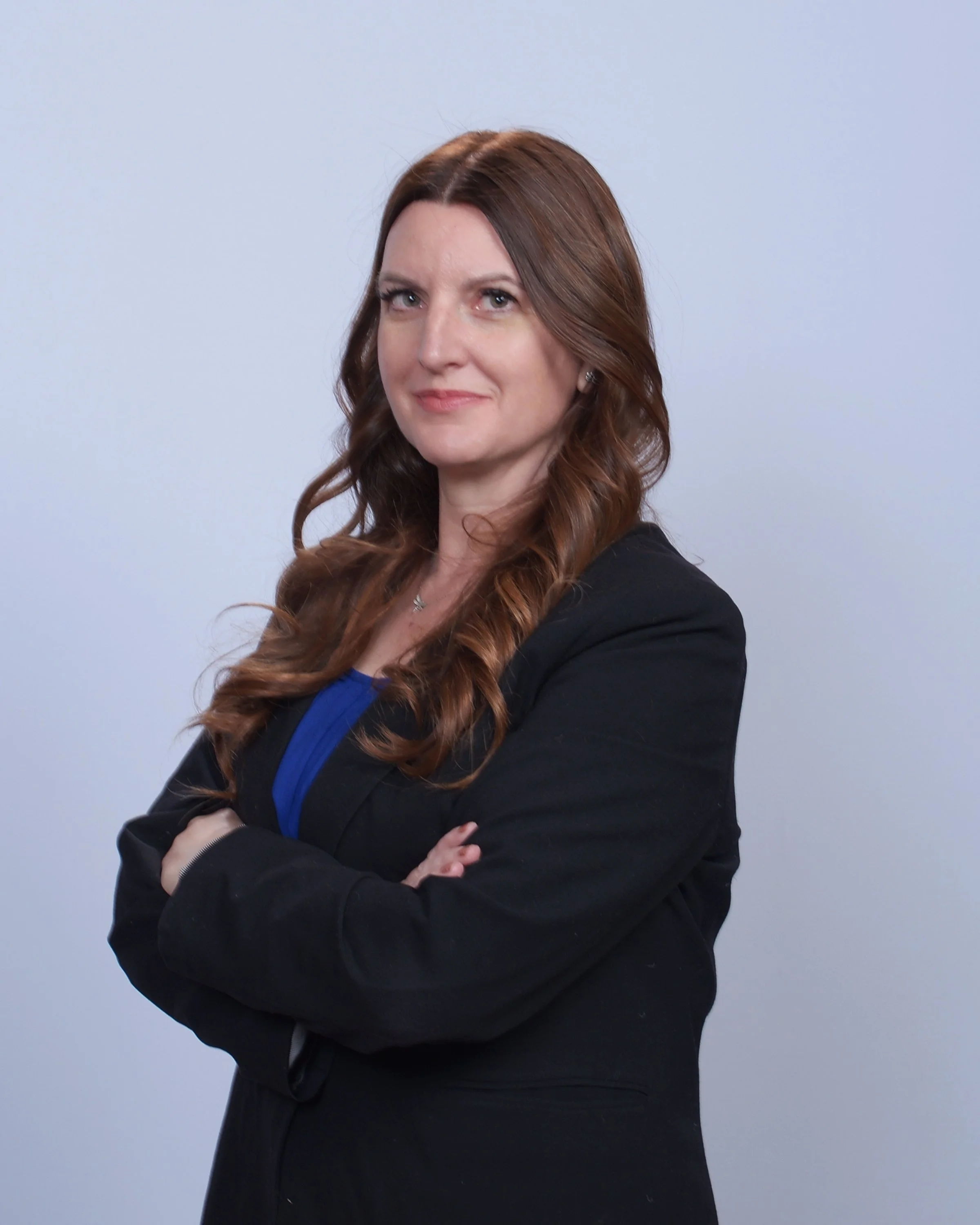 A woman smiles kindly about gestational surrogacy and the compensation benefits available for surrogate mothers.