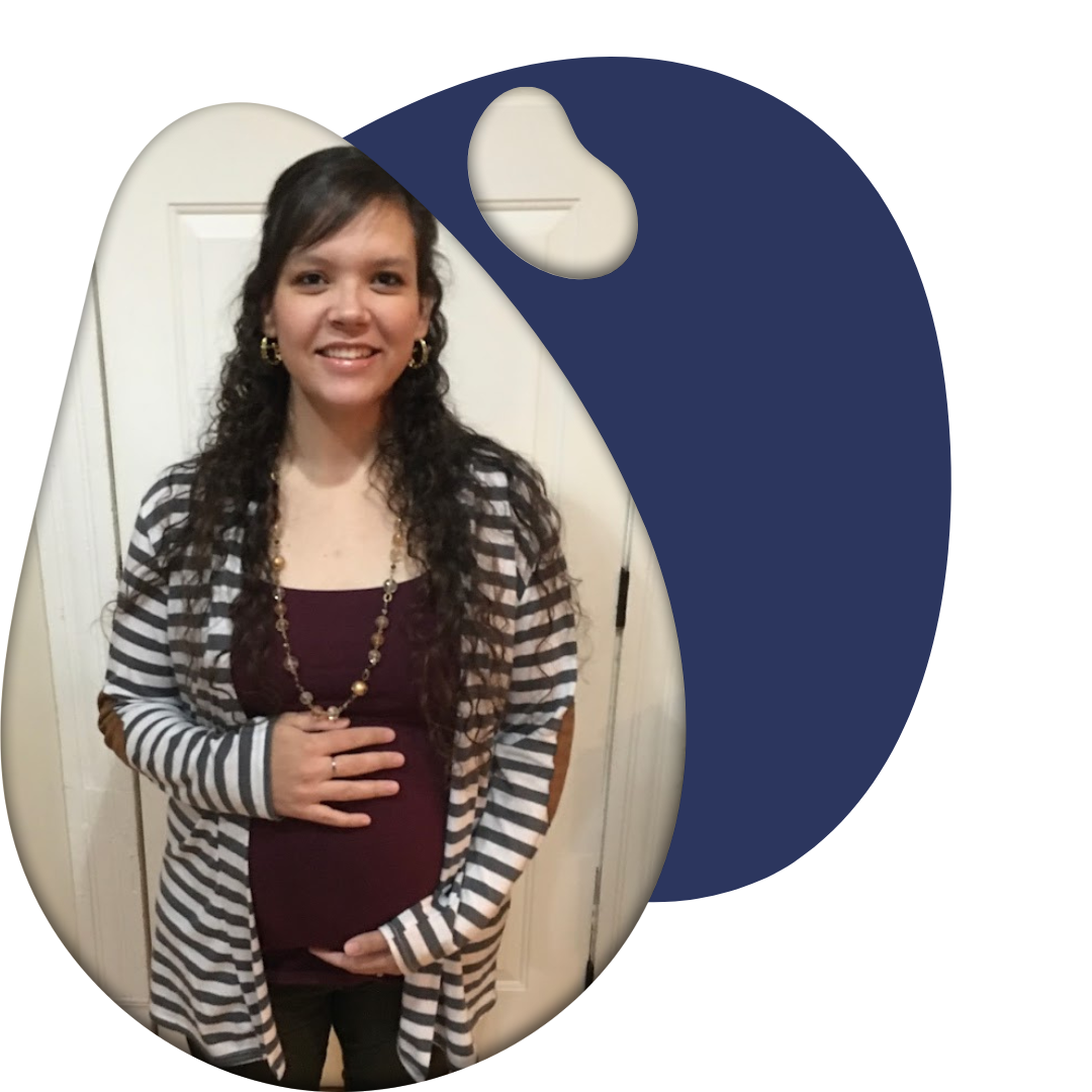 A woman smiles kindly about gestational surrogacy and the compensation benefits available for surrogate mothers.