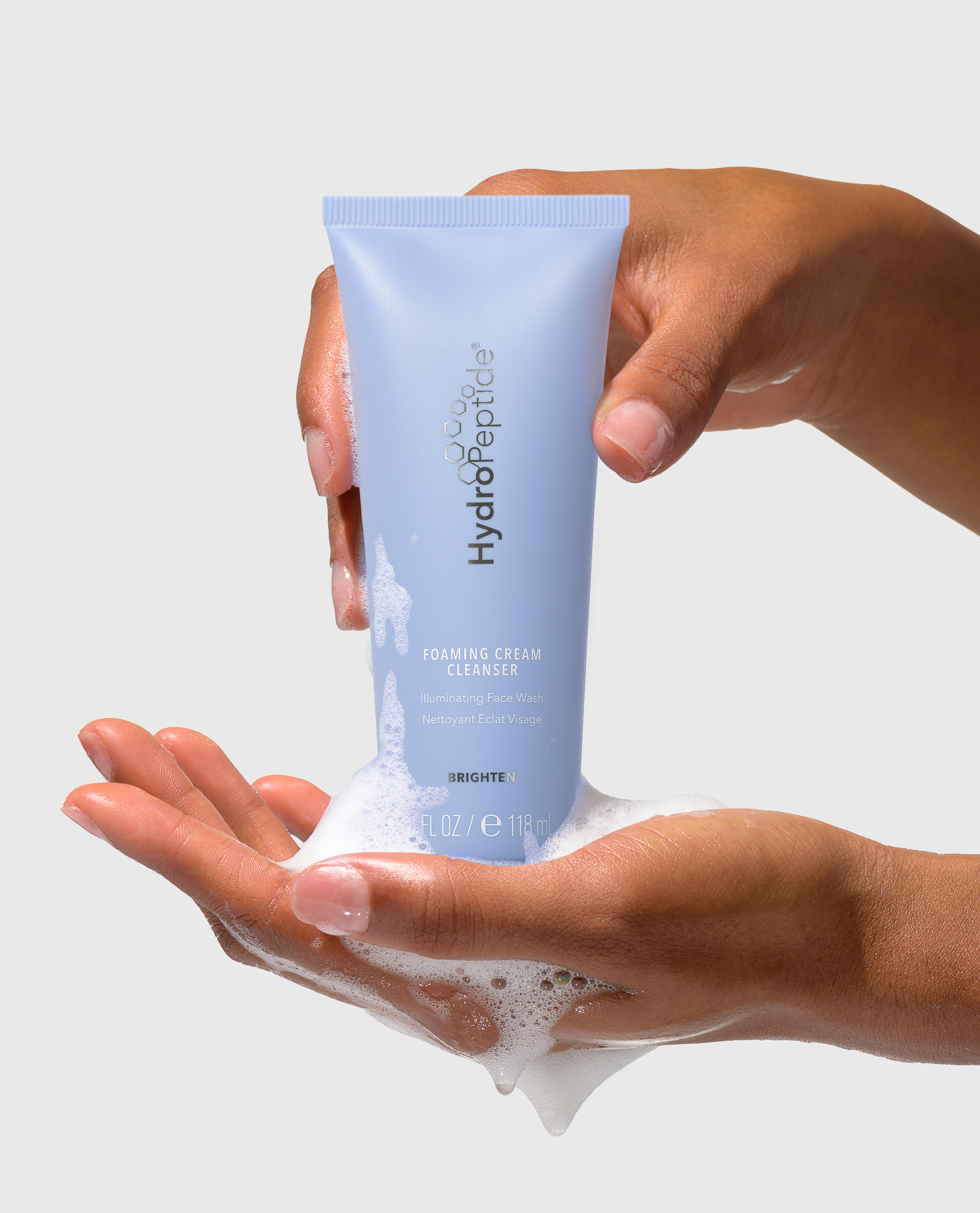 SKNJECT---HydroPeptide-Foaming-Cream-Cleanser-Hand.png
