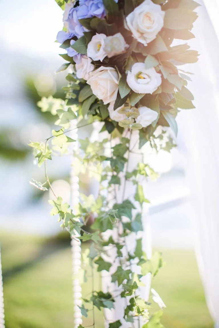 bluewhiteweddingflowerarchphoto01-768x1152.jpg