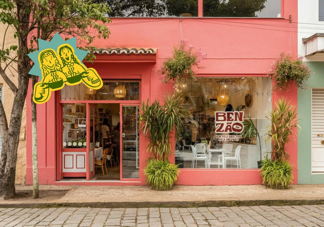 A pink storefront of a bakery or café with plants outside, large window display, and a sign that reads "BEN ZÃO VEM PELO CAFÉ, FIRA PELA AZZANELA." There is a cartoon sticker of two happy girls holding bread on the upper left corner.
