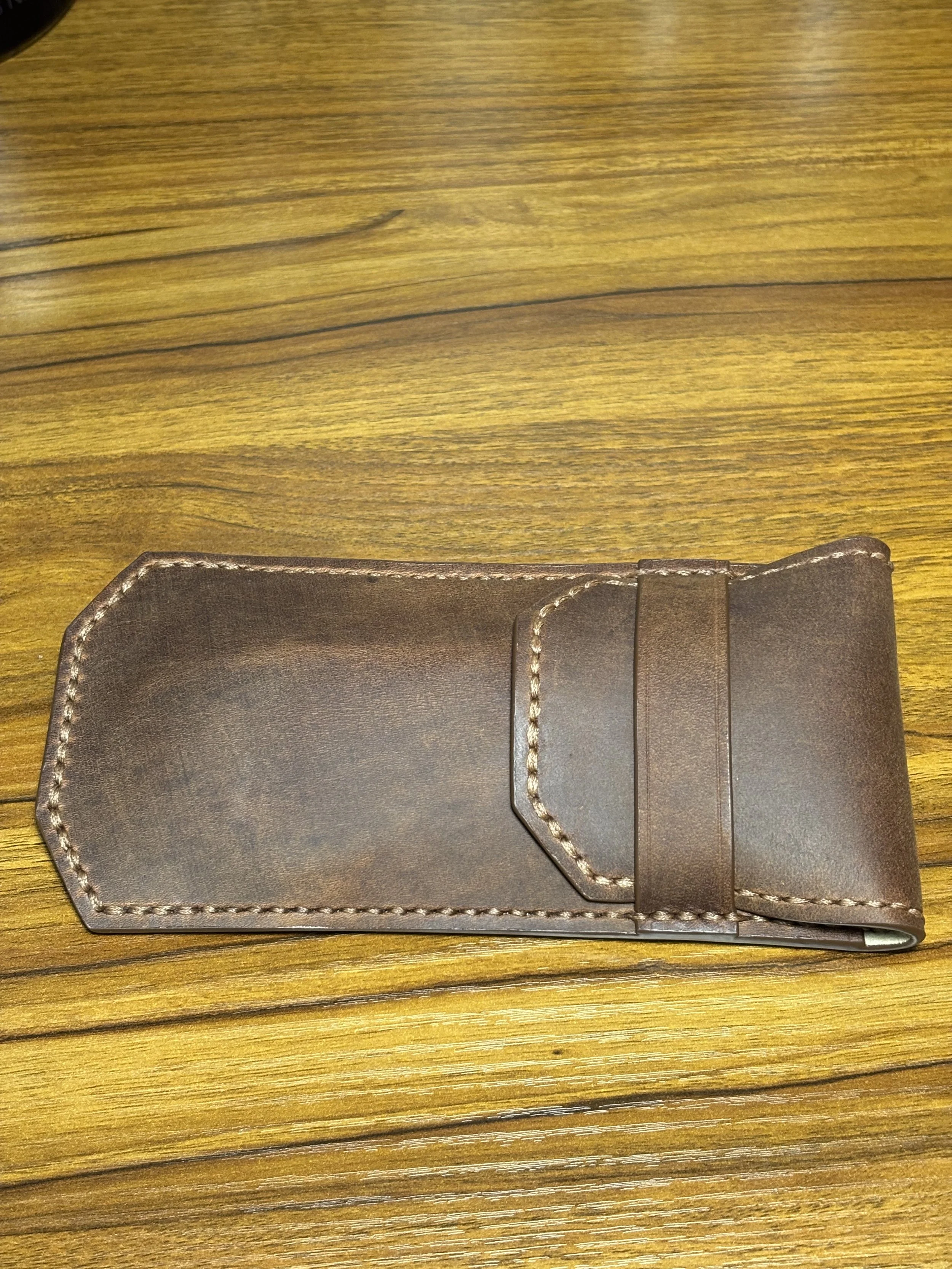 the-lookout-leather-sunglass-case-closed-with-glasses-inside.jpeg