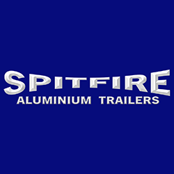 Logo for Spitfire Aluminium Trailers, featuring the name in 3D silver text on a blue background.