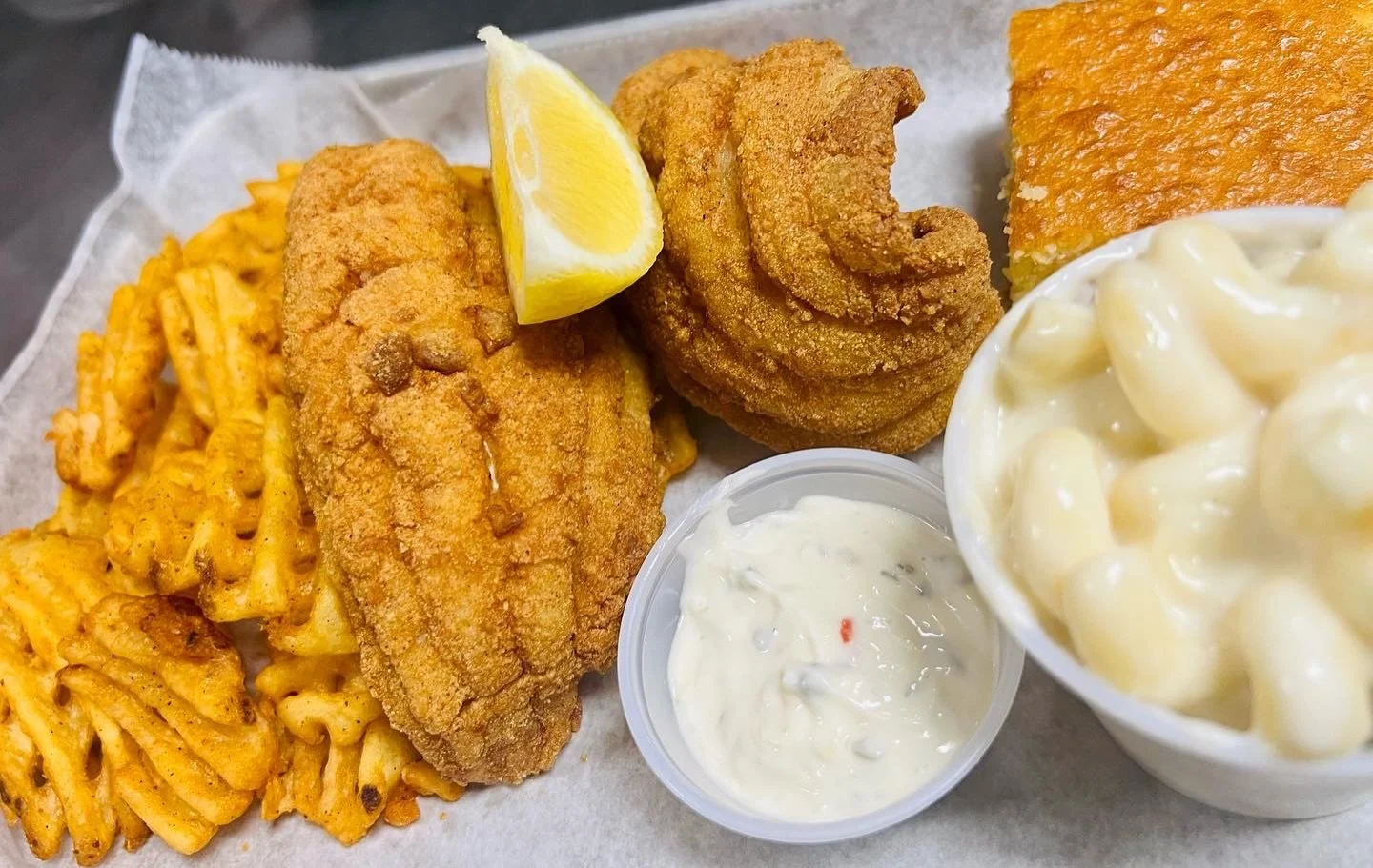 Golden, crispy, and done right 🐟✨
Our hand breaded catfish is fried to perfection and served with classic sides and tartar sauce
A Southern favorite you don&rsquo;t want to miss 😋

#BBQ60  #Route60BBQ  #CatfishPlate  #SouthernEats  #ComfortFood  Wi