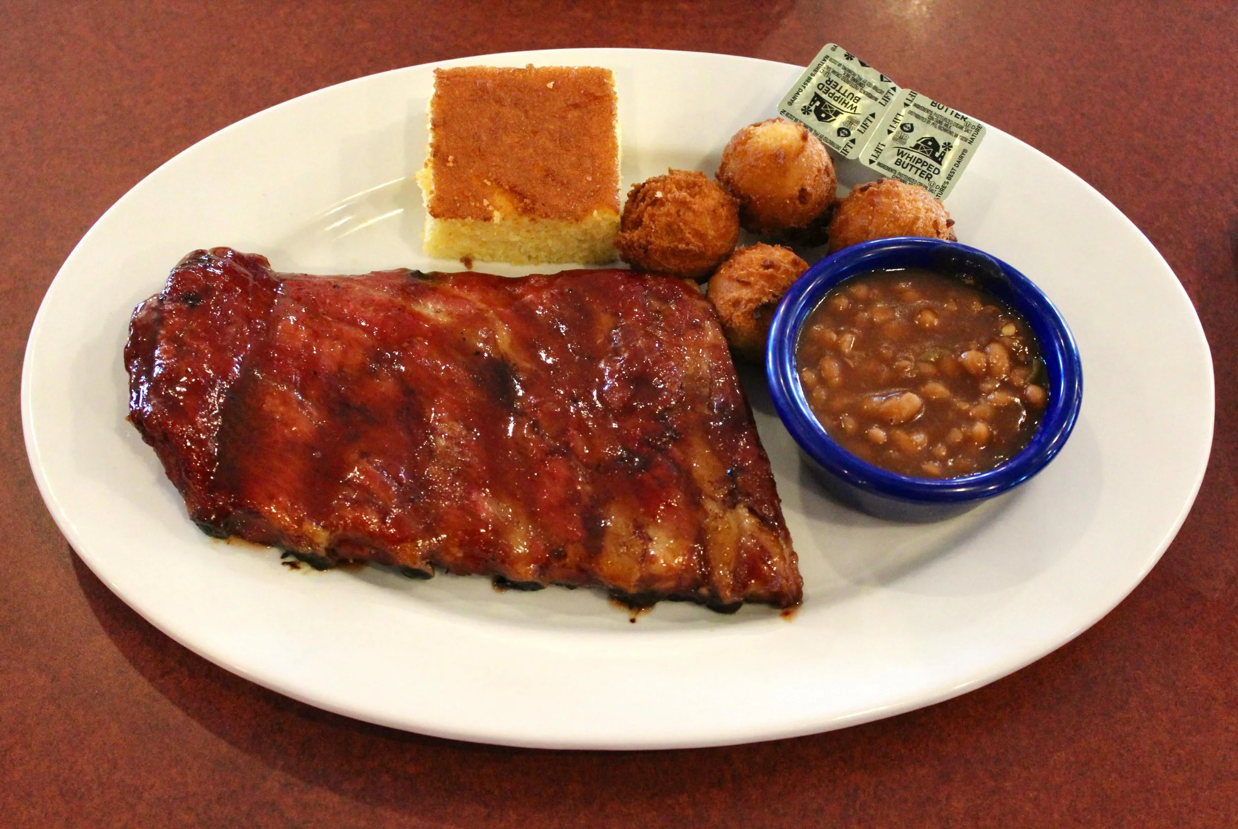 That rich, smoky aroma hits you before the plate even lands on the table🪵🔥 

Our St. Louis style Hickory Smoked Ribs are perfectly caramelized on the outside, incredibly tender on the inside, with just the right balance of sweet and mild dry rub. 

