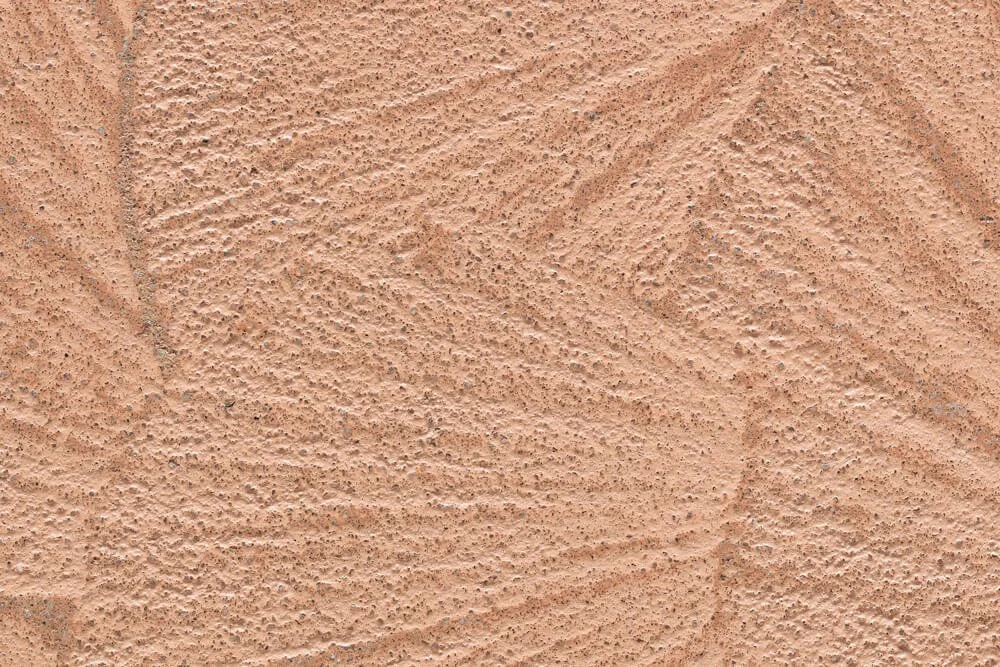 Surface de mur en brique de pierre beige avec texture rugueuse
