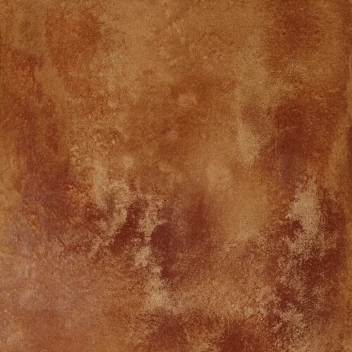 Surface rugueuse de couleur cuivrée ou terre cuite