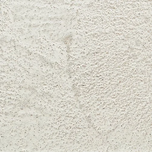Surface de mur en béton avec texture sablée