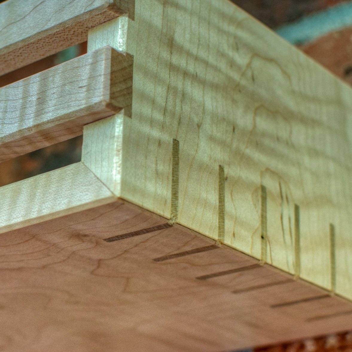 Splines for miter joints; commonly made with contrasting color woods to display joinery