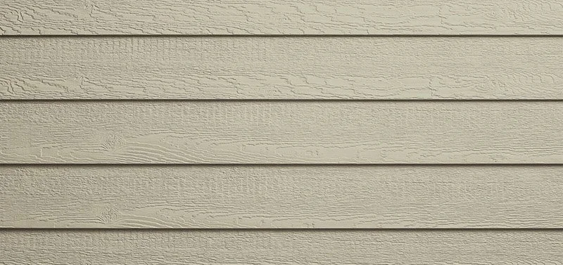 Close-up of beige horizontal wooden siding on a building exterior.