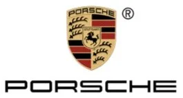 Porsche logo with a shield featuring a horse and antlers, and the word 'PORSCHE' below.