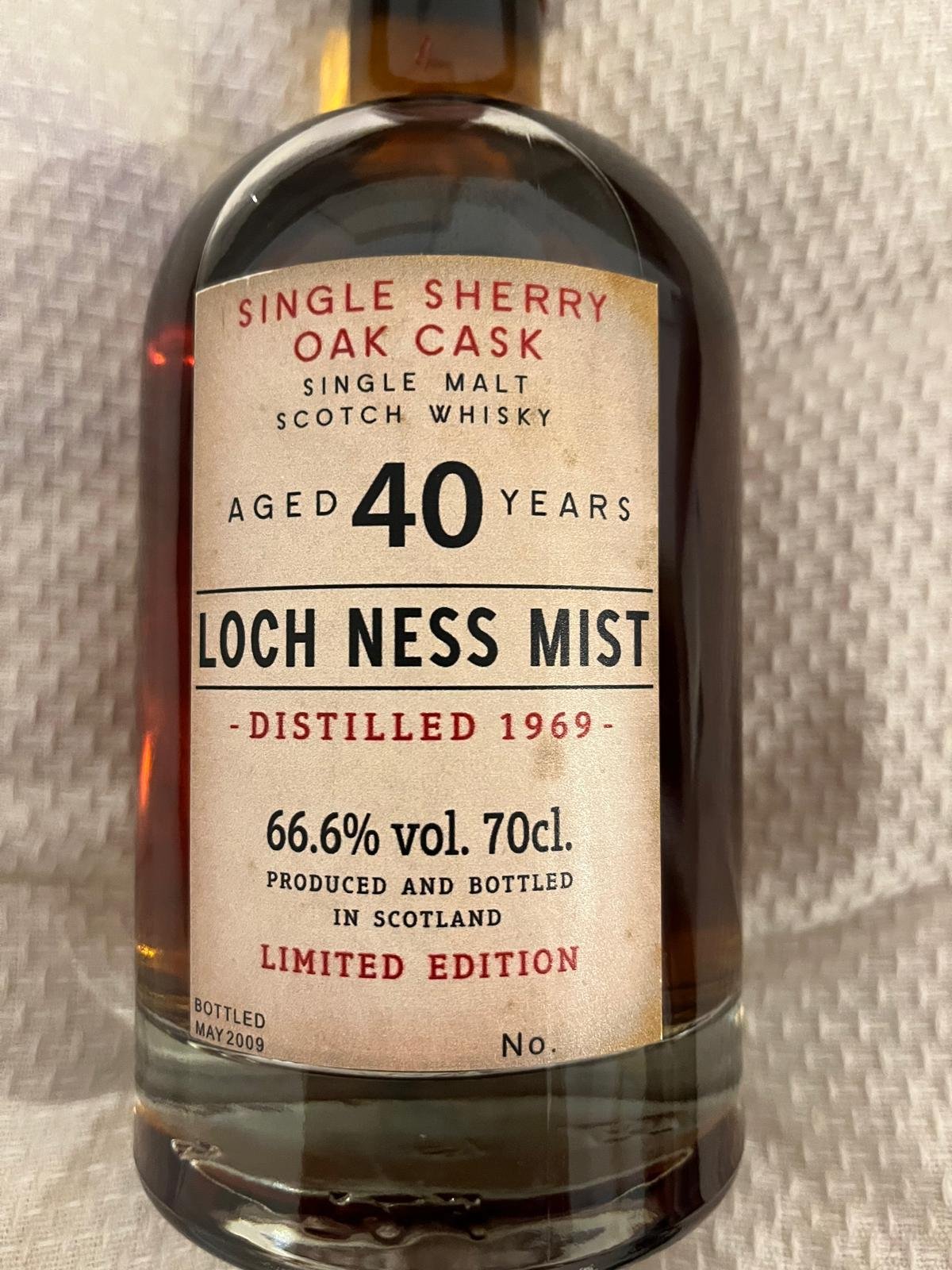 A bottle of single malt Scotch whisky aged 40 years, distilled in 1969, with 66.6% alcohol by volume, produced and bottled in Scotland.