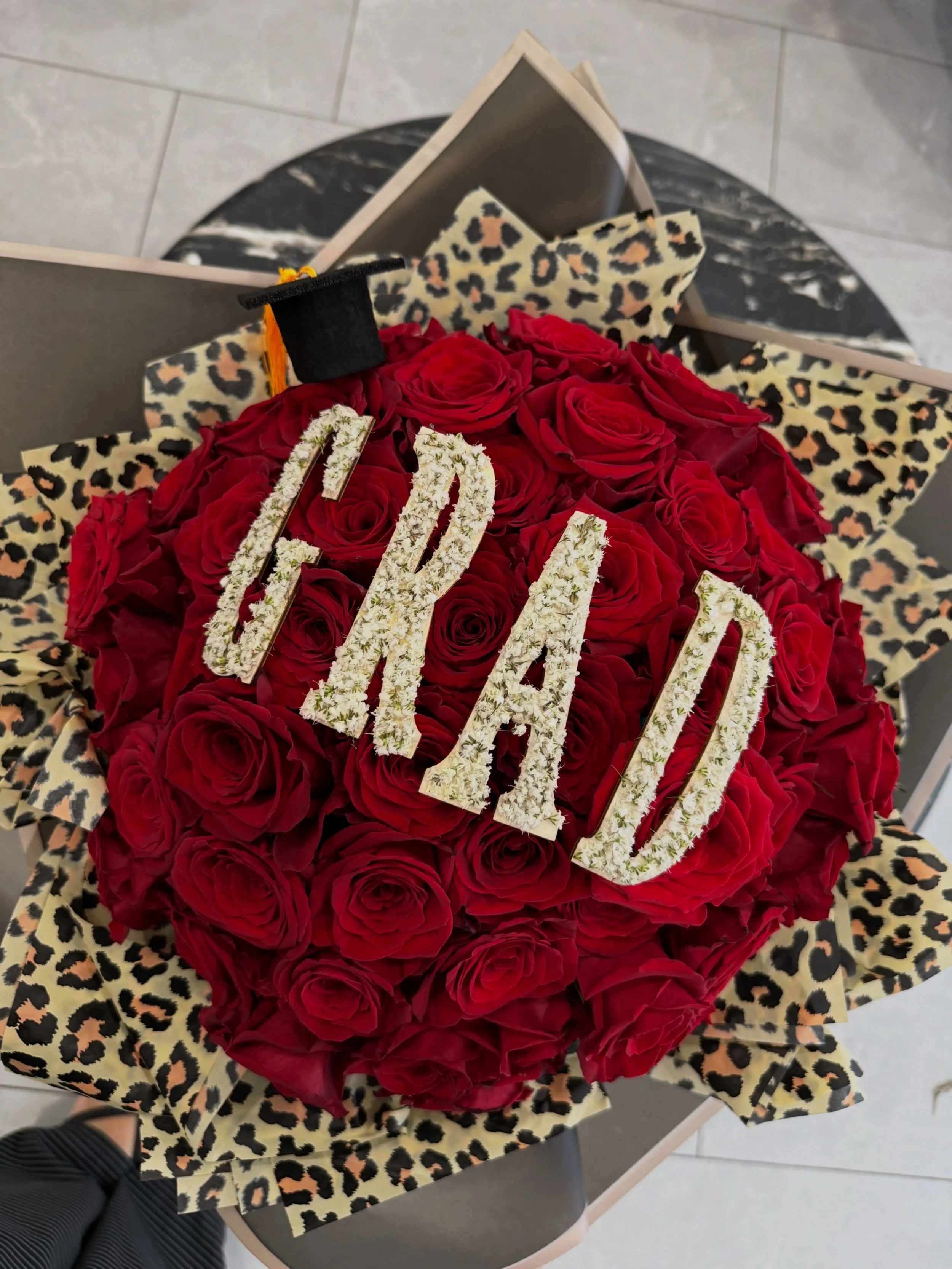 Proof that hard work looks good in flowers 🌸🎓
Congrats to all the grads doing the damn thing