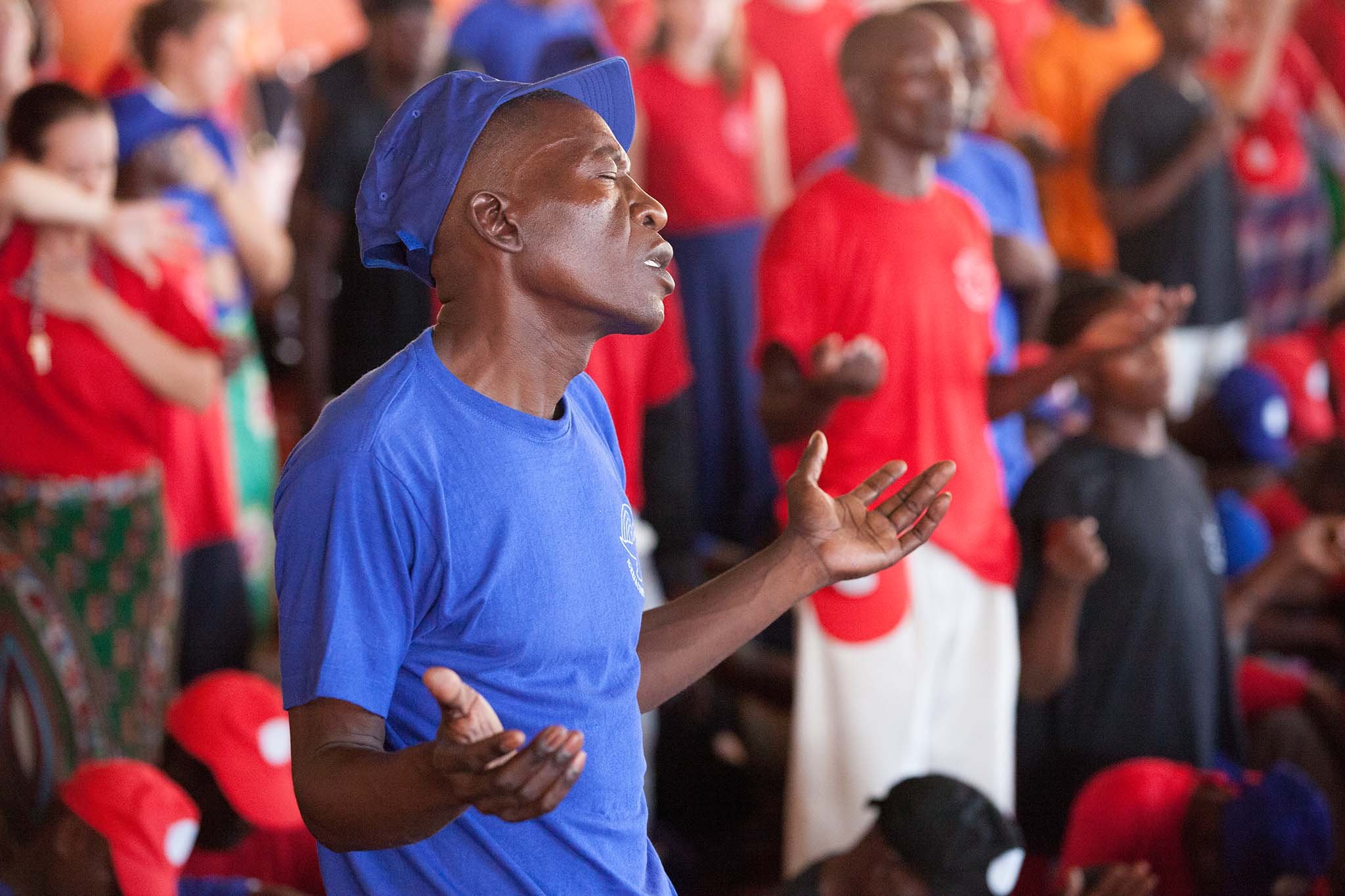 A Bible school pastor in worship