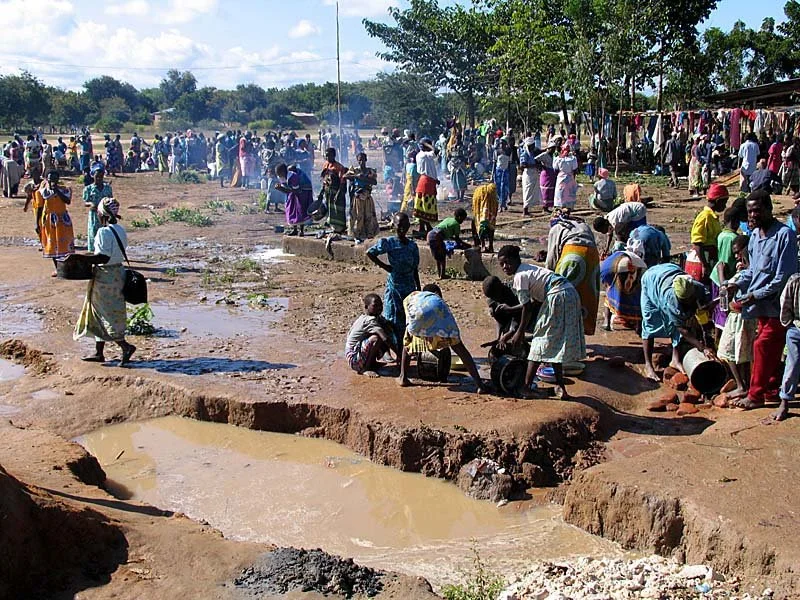 Cooking and washing dishes at a Malawi conference