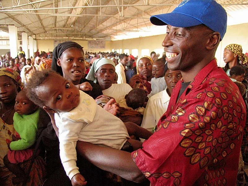 Pastor José, our leading provincial pastor in southern Mozambique, helping us dedicate babies!
