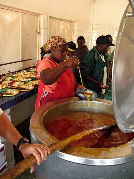 We cook for eight hundred at our Zimpeto center, plus hundreds of visitors from the streets at special occasions like this.